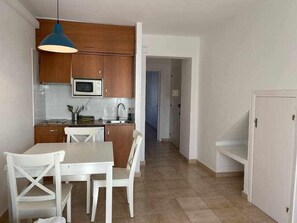 Fridge, microwave, toaster, cookware/dishes/utensils