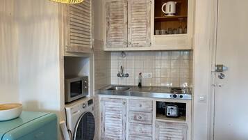Fridge, microwave, coffee/tea maker, toaster