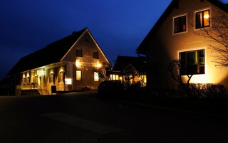 A two-story building with a sign that reads 'Hasenwinkel.'