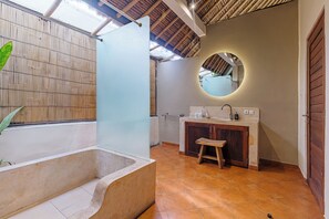 Traditional Villa | Bathroom | Shower, rainfall showerhead, hair dryer, towels