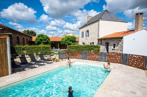 Seasonal outdoor pool, open 10:00 AM to 8:00 PM, sun loungers