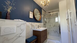 Eco-friendly toiletries, hair dryer, towels, soap