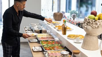 Daily buffet breakfast (EUR 9 per person)