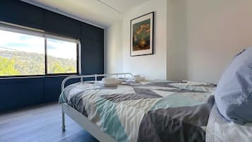 3 bedrooms, desk, iron/ironing board, travel cot