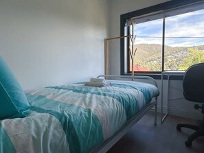 3 bedrooms, desk, iron/ironing board, travel crib