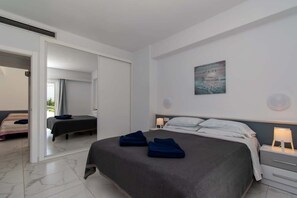 2 habitaciones, tabla de planchar con plancha, wifi y ropa de cama