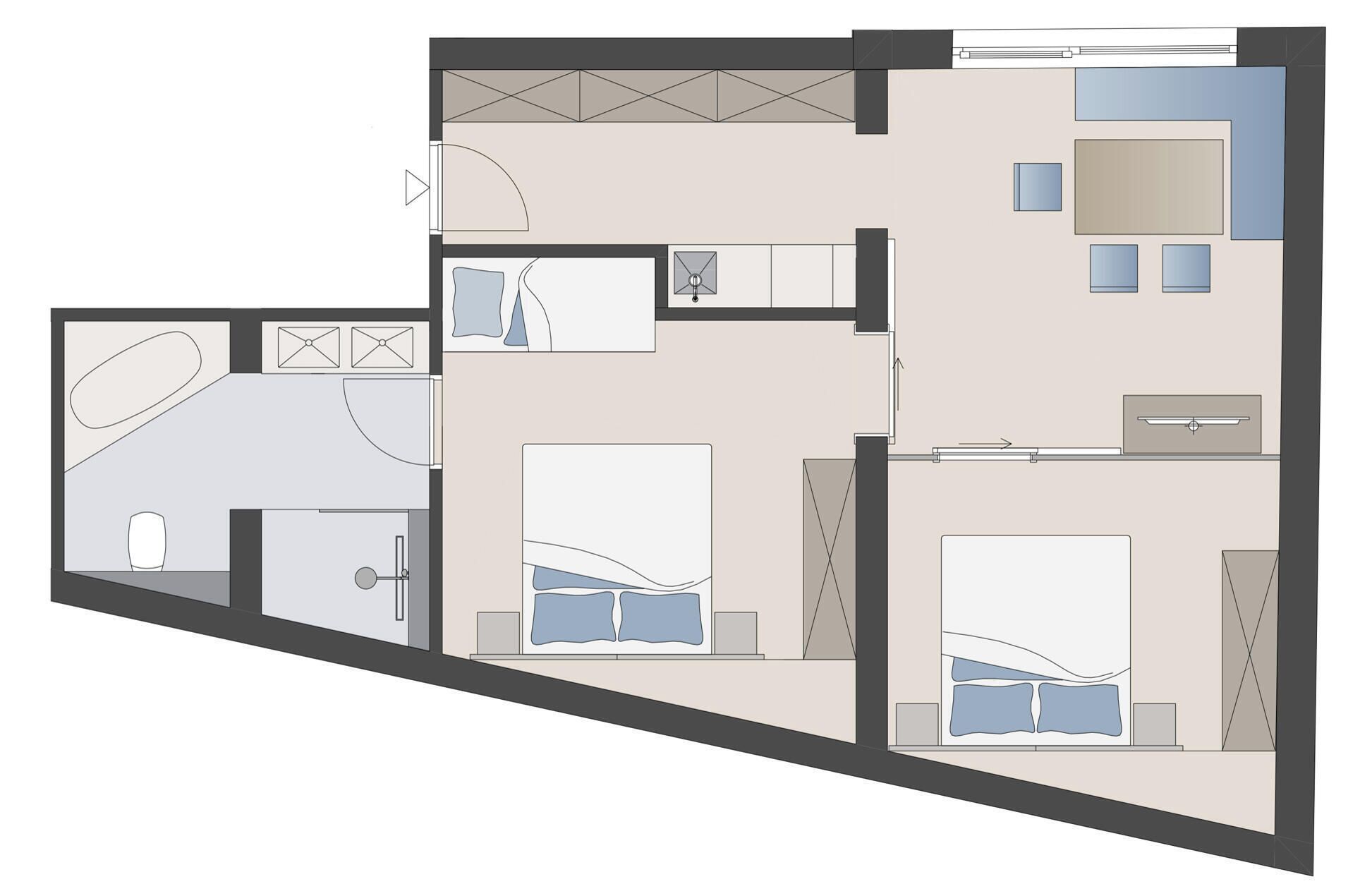 A floor plan with a bedroom, bathroom, and a small kitchenette.