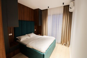 1 chambre, fer et planche à repasser, Wi-Fi, draps fournis
