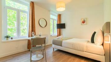 Fer et planche Ă repasser, accĂšs Internet, draps fournis