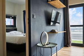 1 غرفة نوم ومكواة/لوح كي وخدمة الإنترنت وملاءات أسرّة