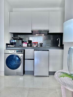 Microwave, stovetop, coffee/tea maker, toaster