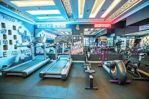 Stay fit and motivated in our well-equipped gym with treadmills, stationary bikes, and rowing machines.