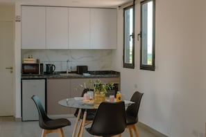 Apartamento exclusivo | Cocina privada | Mesa de comedor