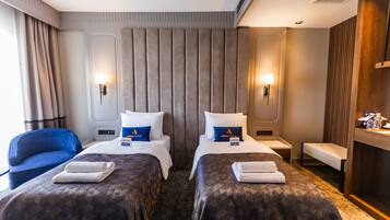 Family Quadruple Room | Premium bedding, minibar, in-room safe, desk
