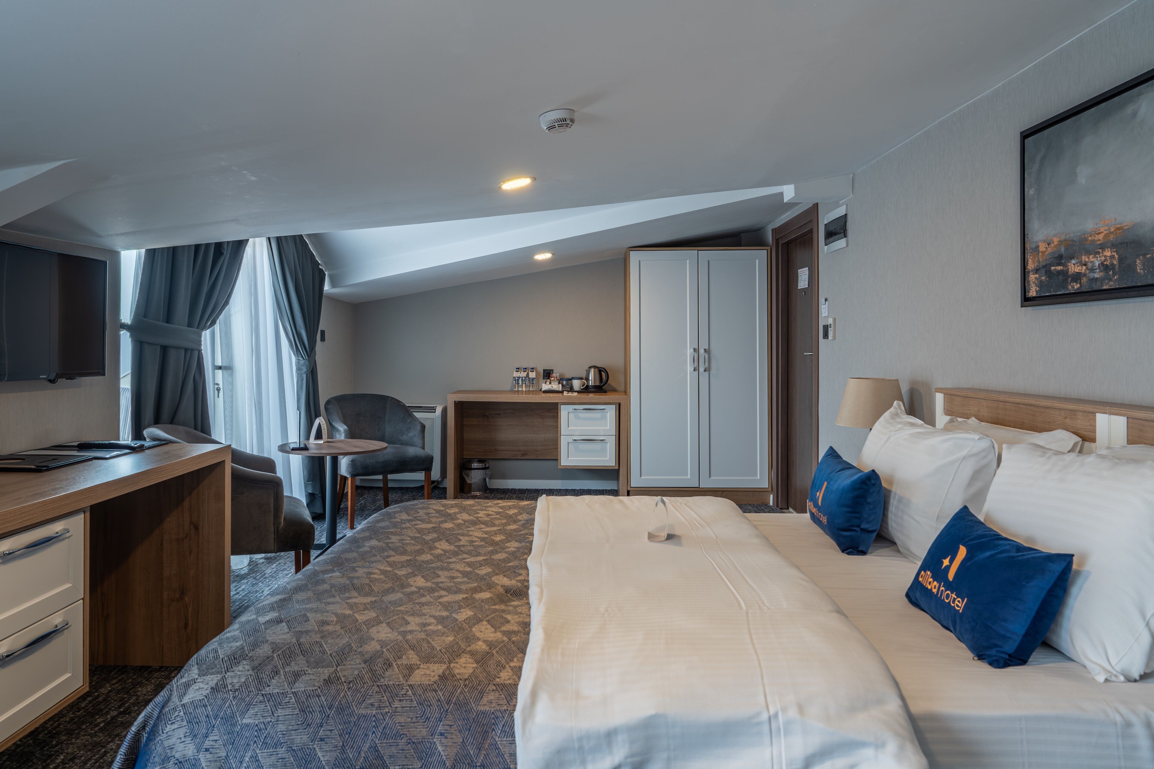 Economy Terrace Room | Premium bedding, minibar, in-room safe, desk