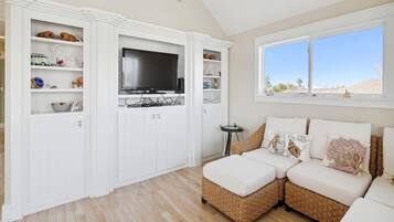 House, Multiple Beds, Balcony | Living area | 35-inch flat-screen TV with cable channels, TV