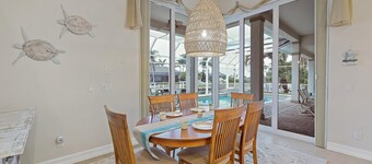 Beachy West Exposure Waterfront Home With Pool and spa