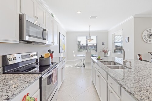 Modern Waterfront Home in Artesia With Pool/gym