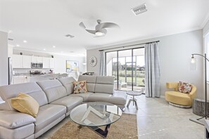 Living area - Modern Waterfront Home in Artesia With Pool/gym (Naples)