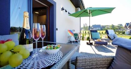 Comfortable holiday homes with terraces, Mielenko