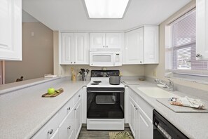 Condo, 1 Queen Bed (Quaint condo steps to the beach and d) | Private kitchen