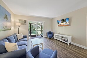 Condo, 1 Queen Bed (Quaint condo steps to the beach and d) | Living area