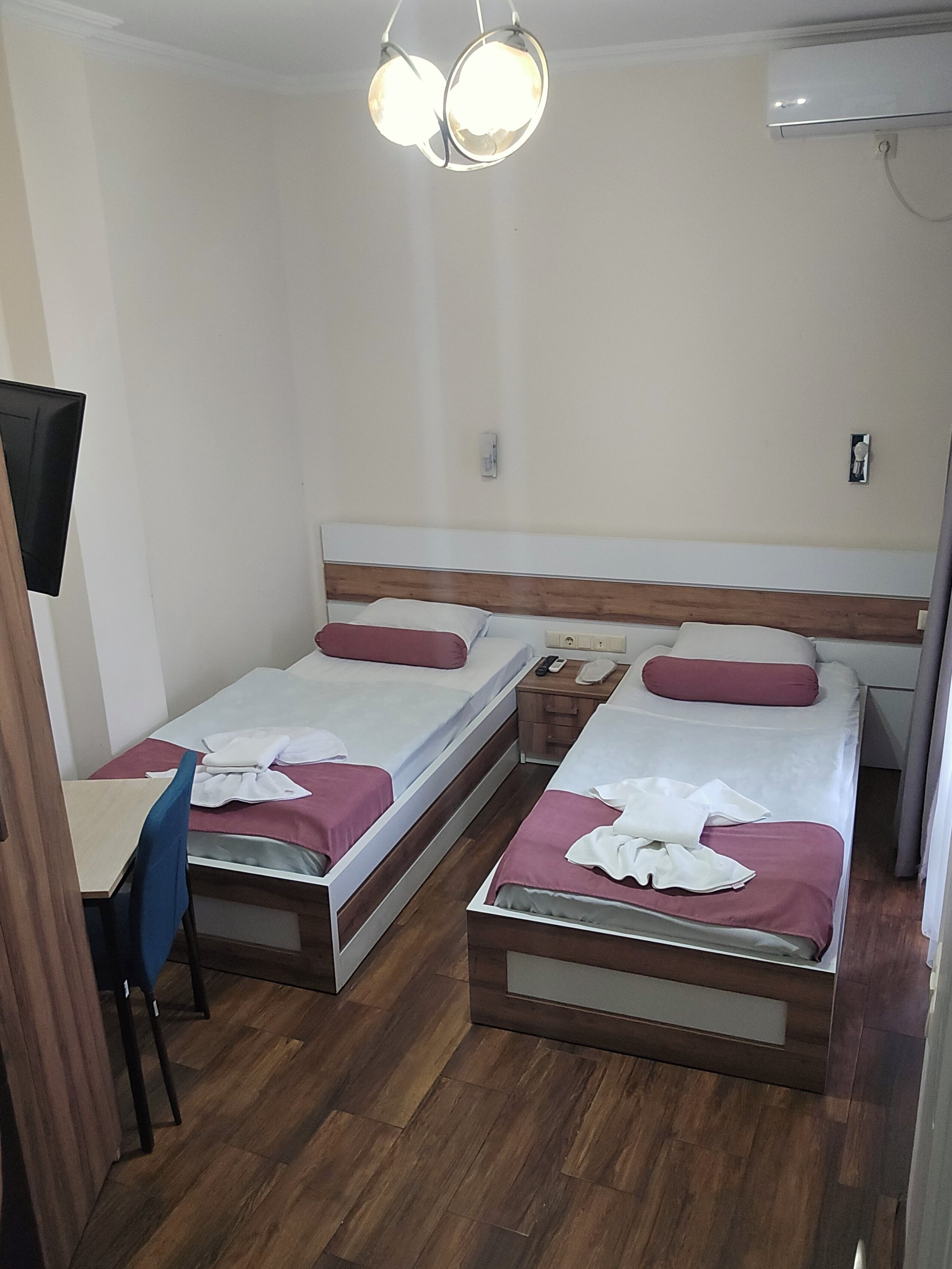 Premium bedding, down duvets, desk, laptop workspace