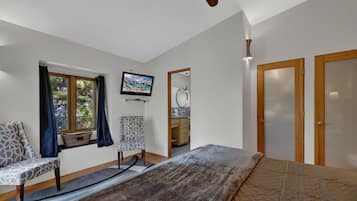 Studio, 1 Tempat Tidur King, hot tub | 1 kamar tidur dan didekorasi berbeda-beda