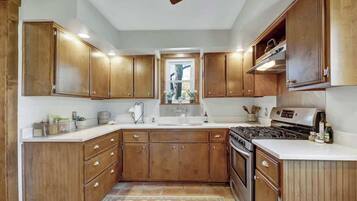 House, Multiple Beds, Patio (802 East Austin St.) | Private kitchen | Coffee/tea maker