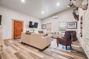 House, Multiple Beds, Patio (465 Bear Crk H & G) | Living area - German and Winzing Haus (Fredericksburg)