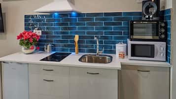 Suite básica | Cocina privada | Horno, tostadora, plancha de cocina y batidora