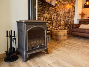 Luxury Suite | Living area | Flat-screen TV, fireplace