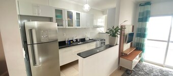 Foot in the sand at Caiçara beach II