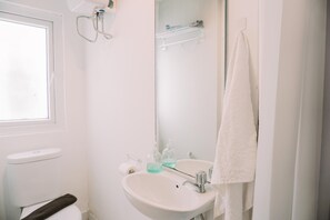 Studio | Bathroom | Shower, free toiletries, towels - Enjoy Living Studio (No Kitchen) Apartment Aeropolis Residence (Tangerang)