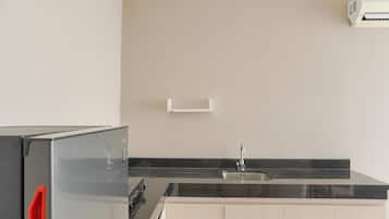 Apartment | Private kitchen | Full-size fridge, stovetop