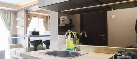Apartment | Private kitchen | Full-sized fridge, stovetop, rice cooker, cookware/dishes/utensils