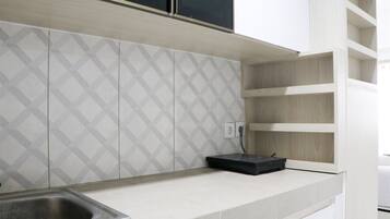 Estudio | Cocina privada | Refrigerador con congelador y parrilla de estufa