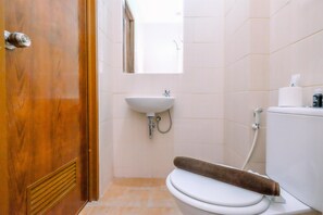 Estudio | Baño | Ducha y toallas