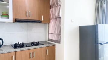 Apartment | Private kitchen | Full-sized fridge, stovetop