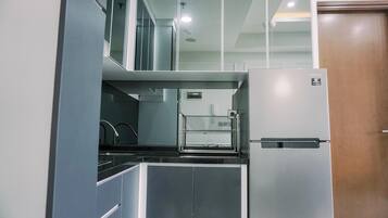 Apartment | Private kitchen | Full-size fridge, stovetop
