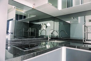 Departamento | Cocina privada | Refrigerador con congelador y parrilla de estufa