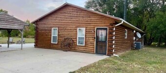 Riverfront Studio Cabin w/ Sunset View, Wi-Fi, Yard, and Fire-pit!
