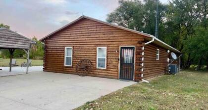 Riverfront Studio Cabin w/ Sunset View, Wi-Fi, Yard, and Fire-pit!