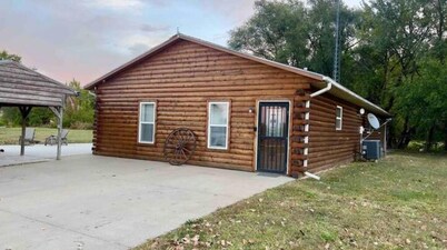 Riverfront Studio Cabin w/ Sunset View, Wi-Fi, Yard, and Fire-pit!