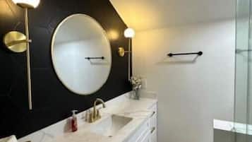 Hair dryer, towels, soap, shampoo