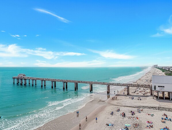 On the beach, sun-loungers, beach towels