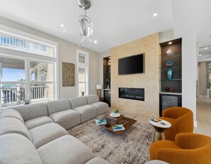 Smart TV, fireplace, table football, books