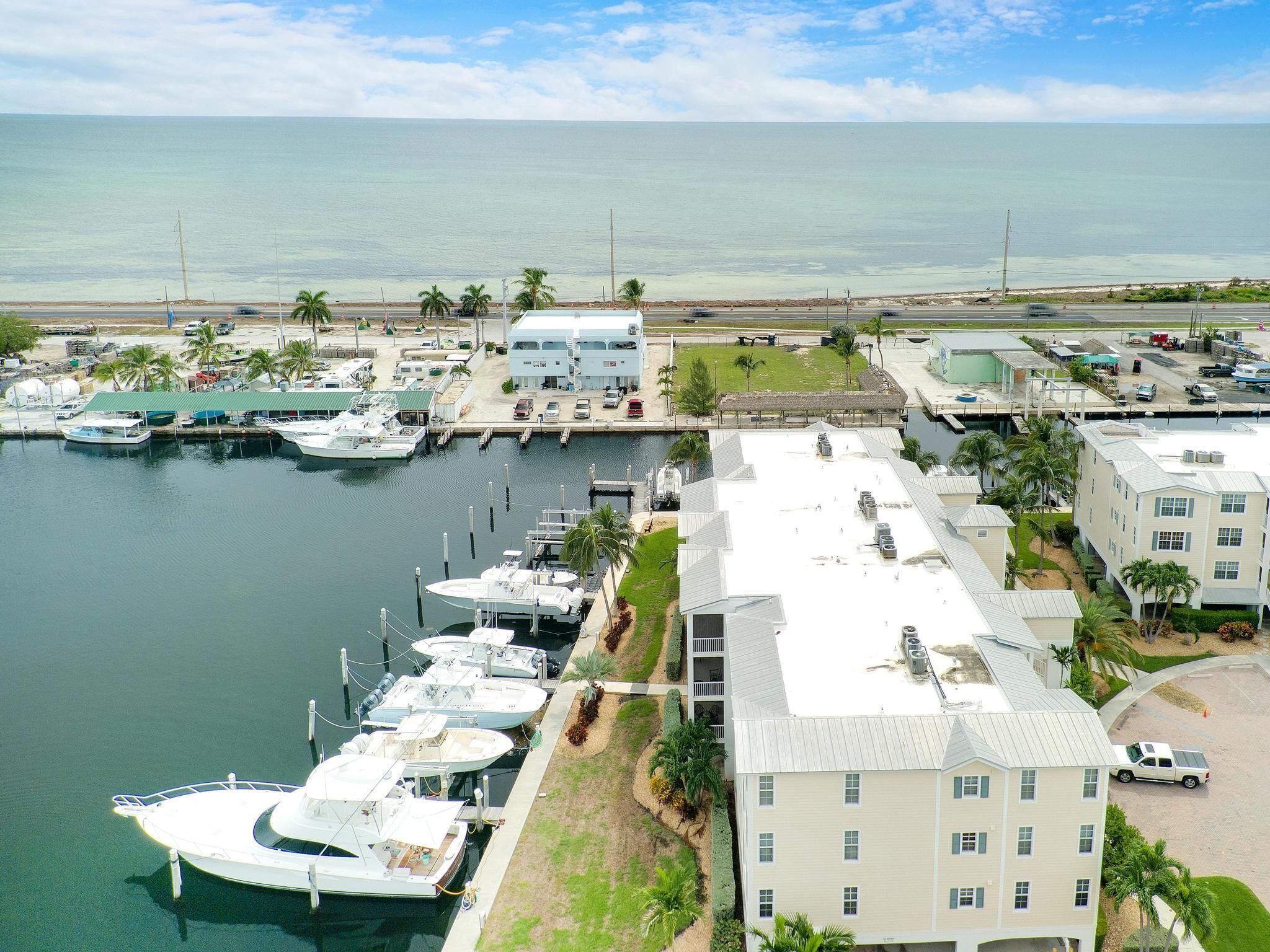 DELUXE ISLAMORADA PENTHOUSE CONDO WITH 50' BOAT SLIP AND 25,000# LIFT