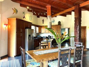 Dining - Nestled on a lush hillside, offering comfort, sea views, and beach access. (West Bay)