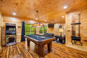 A wooden interior with a pool table, a billiards rack, and a billiard cue rack. - Cliffview Resort Lakefront 4BR, 3BTH- No Smoking/Pets. Fishing Dock, Game Rm. (Campton)